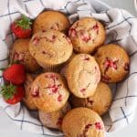 Plant-based strawberry sourdough muffins in a bowl.