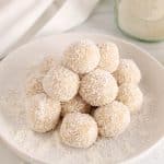 Vegan lemon bliss balls on a white plate.