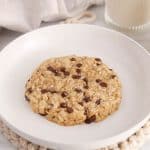 Single serve oatmeal chocolate chip cookie on a plate.