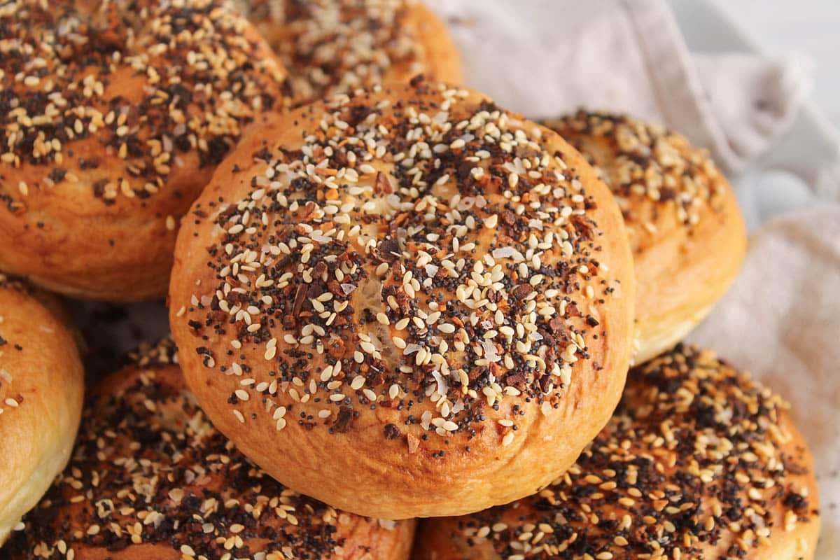 A homemade sourdough discard bagels covered with everything seasonings.