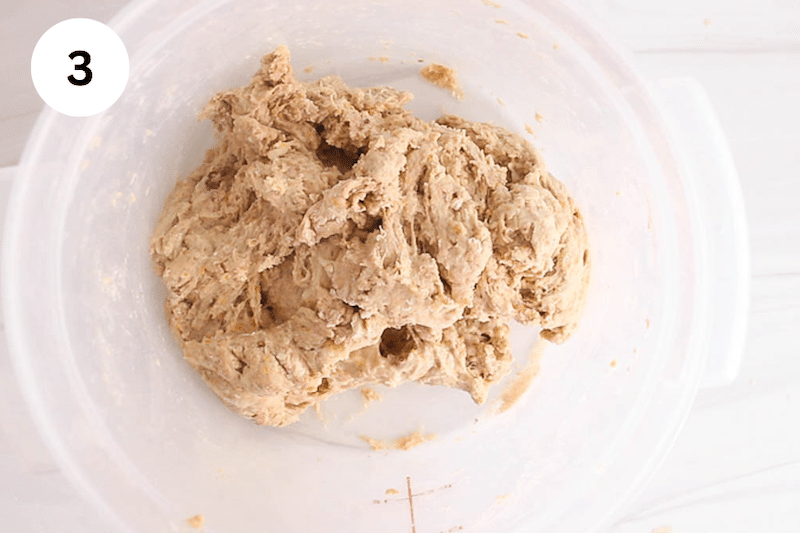 A container with a shaggy dough.