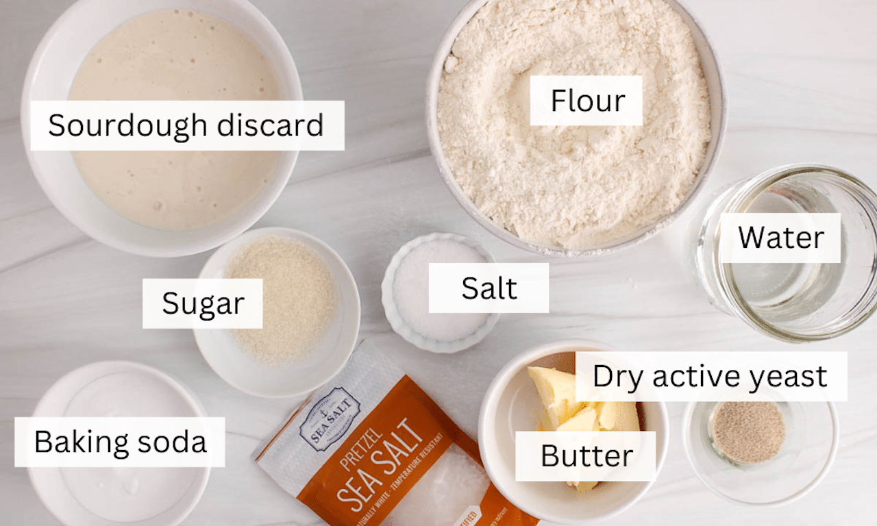 Showing are the ingredients needed to make sourdough discard pretzel bites placed on the counter.