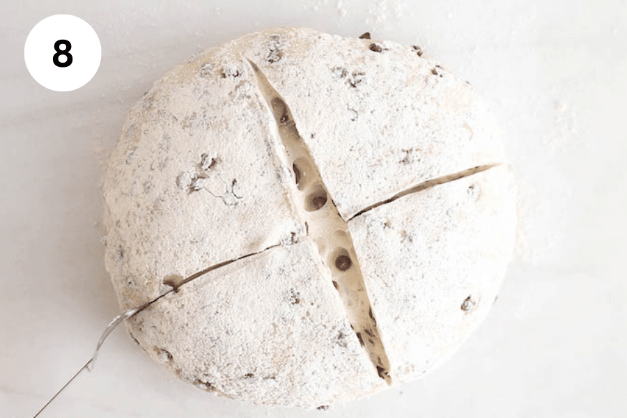 A blade scoring a dough.